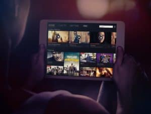 Foxtel Go iPad Man Holding iPad Mockup