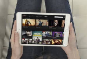 Foxtel Go Home Woman Holding iPad Mockup